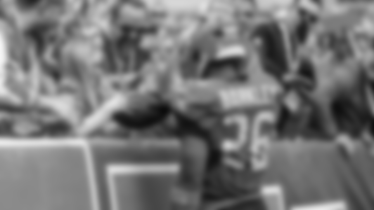 Saquon Barkley gives this young fan a souvenir of a lifetime.