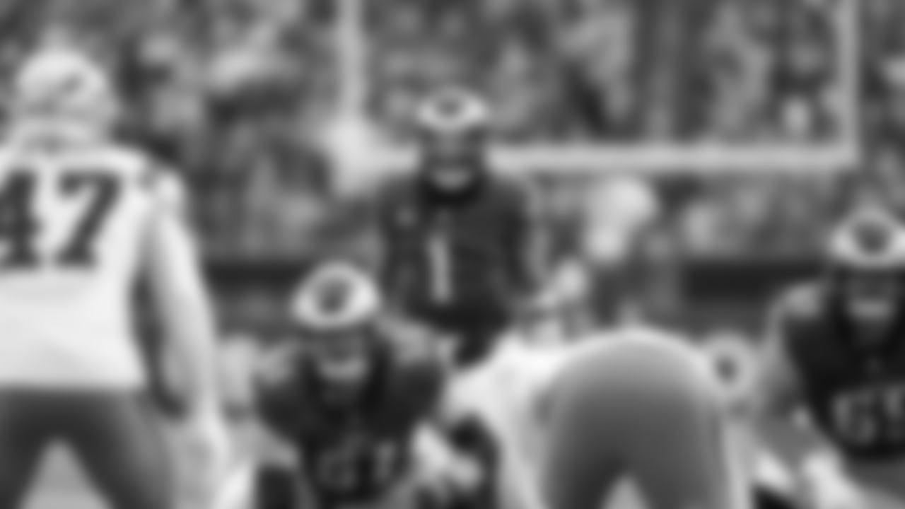 C/G Cam Jurgens, QB Jalen Hurts, and G Landon Dickerson