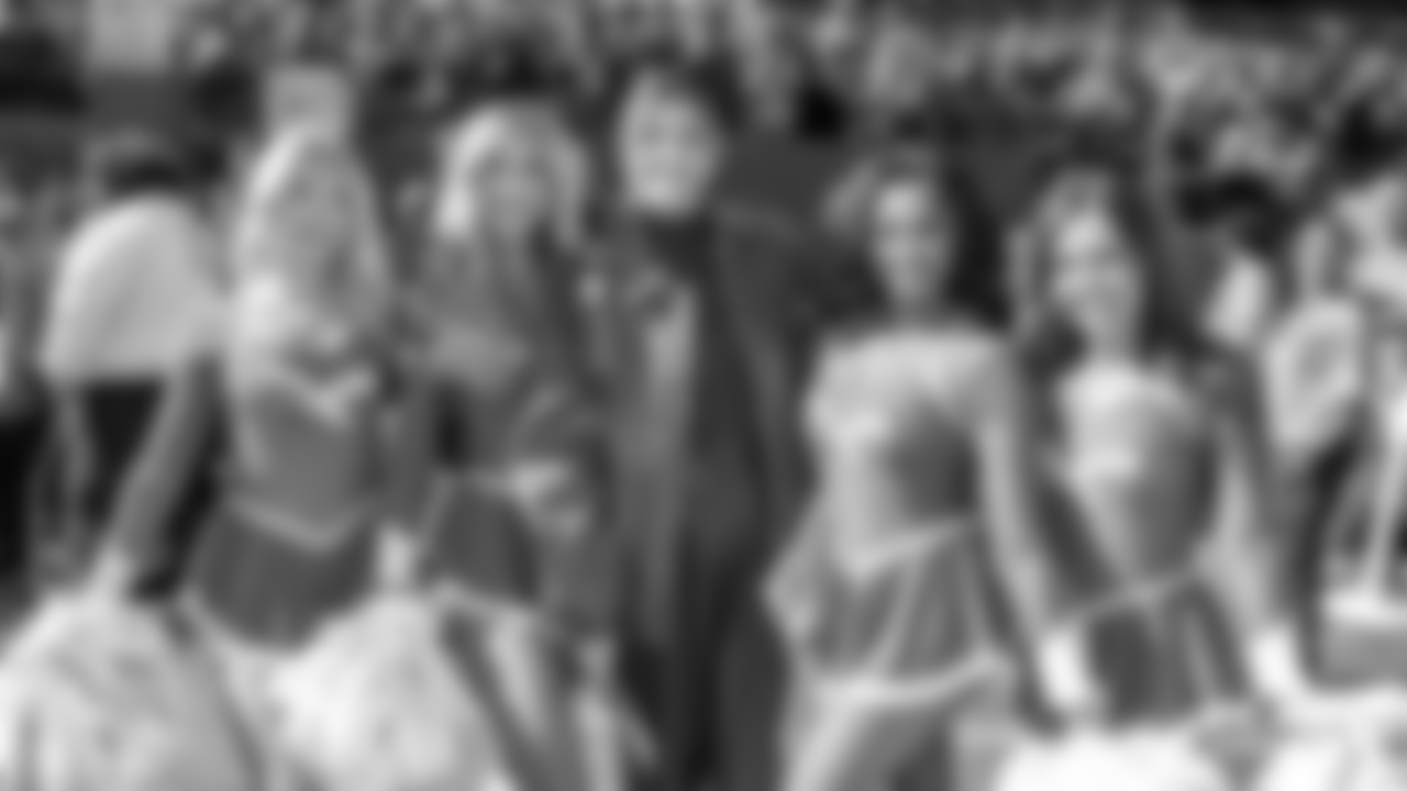 Cheerleaders Ashton, Erin, Mieka, and Marissa with Erin Andrews
