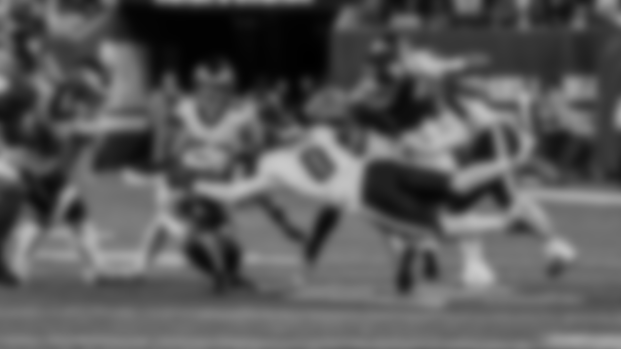 OLB Joshua Uche and DB Cooper DeJean