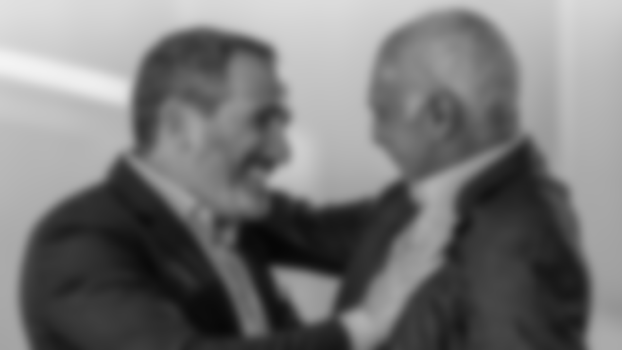 Howie Roseman and Chairman and CEO Jeffrey Lurie celebrate the trade that nets linebacker Jihaad Campbell.