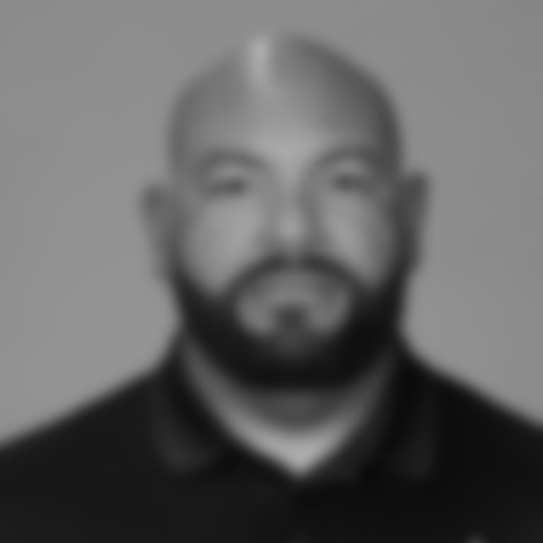 A headshot of assistant strength and conditioning coach Jason Benguche of the Arizona Cardinals in May 2024.