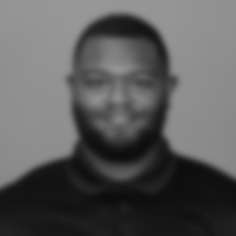 A headshot of Bill Bidwill coaching fellow Blaine Gautier of the Arizona Cardinals in May 2024.