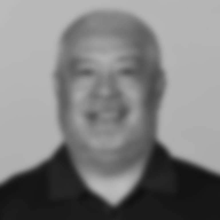 Running backs coach Kennedy Polamalu.