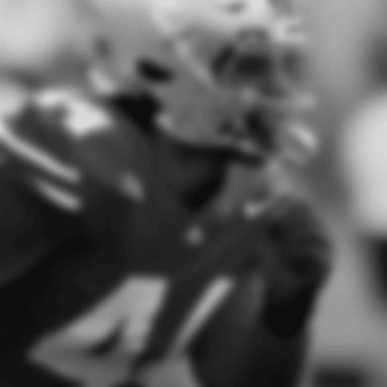 JT Tuimoloau Action Shot