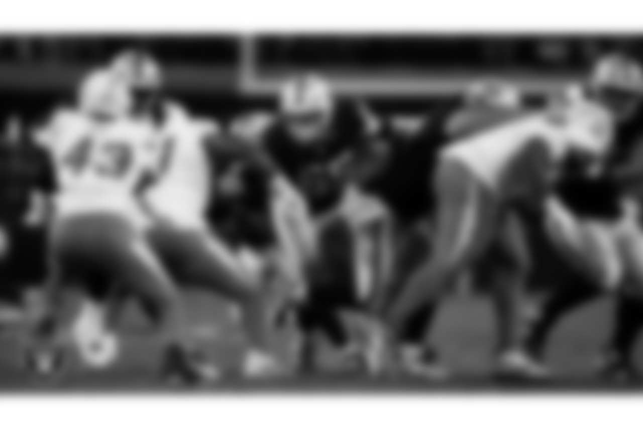 Las Vegas Raiders guard Alex Cappa (65) blocks during the regular season home game against the Los Angeles Chargers at Allegiant Stadium.