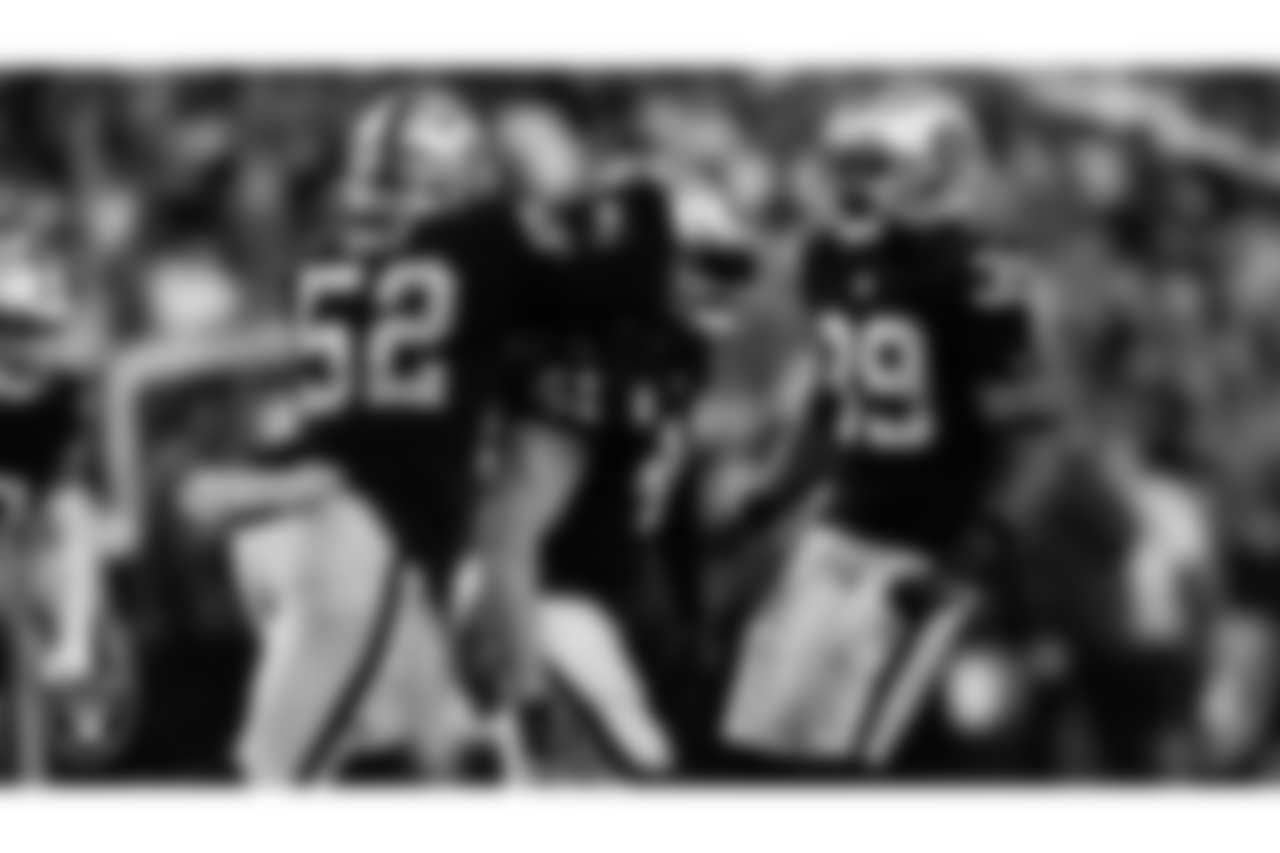 Las Vegas Raiders linebacker Malik Reed (52), linebacker Robert Spillane (41) and cornerback Nate Hobbs (39) during the regular season home game against the New York Jets at Allegiant Stadium.
