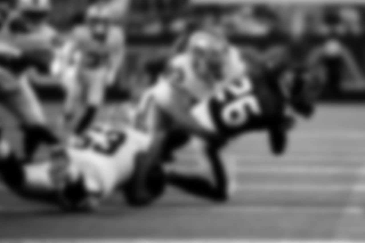 Las Vegas Raiders tackle Folorunso Fatukasi (63) and defensive end Patrick Johnson(93) during the preseason game against the Houston Texans at Reliant Stadium.