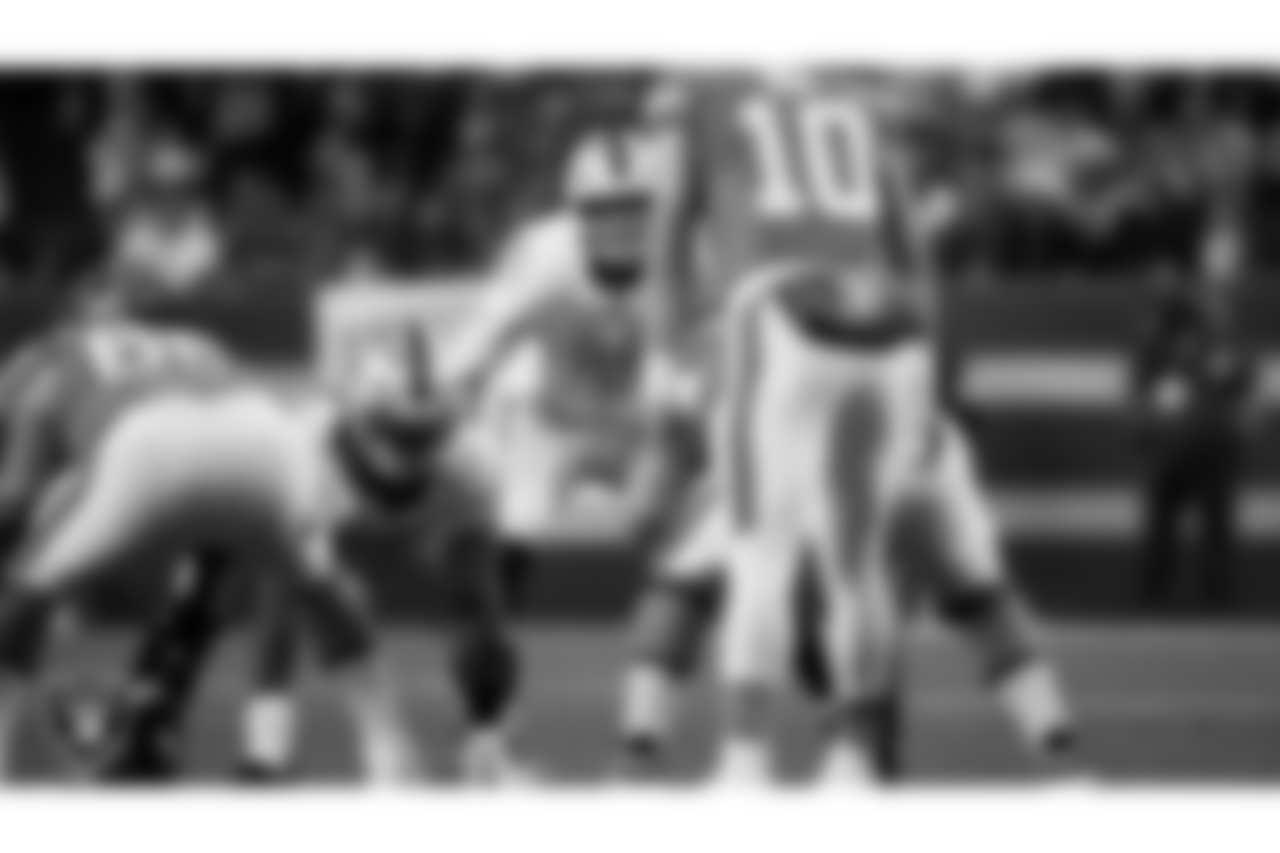 Las Vegas Raiders defensive end Charles Snowden (49) lines up before the snap during the regular season away game against the Denver Broncos at Empower Field at Mile High.