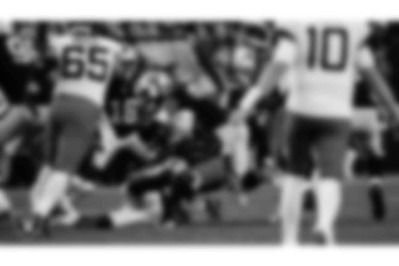 Las Vegas Raiders linebacker Robert Spillane (41) and defensive lineman Adam Butler (69) during the regular season home game against the Jacksonville Jaguars at Allegiant Stadium.