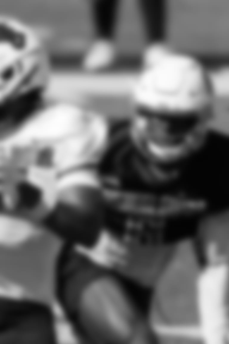 National wide receiver Malachi Corley of Western Kentucky (81) catches a pass as National defensive back Chau Smith-Wade of Washington St (6) defends during practice for the Senior Bowl NCAA college football game, Tuesday, Jan. 30, 2024, in Mobile, Ala. (AP Photo/ Butch Dill)