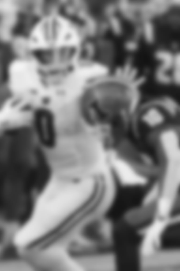 Wisconsin running back Braelon Allen carries the ball as Illinois defensive back Miles Scott comes up for the tackle during the first half of an NCAA college football game Saturday, Oct. 21, 2023, in Champaign, Ill. (AP Photo/Charles Rex Arbogast)