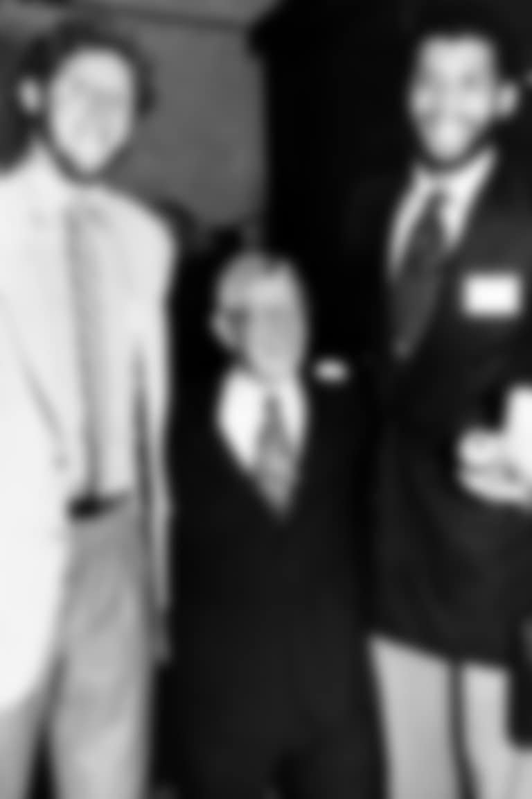 John Wooden, former head basketball coach for University of California at Los Angeles (UCLA), center, poses with UCLA alumni and pro basketball stars Bill Walton, left, and Kareem Abdul-Jabbar during a birthday party for Wooden in Los Angeles, Ca., Oct. 20, 1980.  Nearly 1,000 people including over 100 former UCLA basketball players attended Wooden's 70th birthday celebration.  Abdul-Jabbar was known as Lew Alcindor when he played for the Bruins in the 1960s.  (AP Photo)