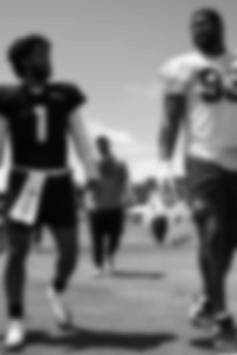 Arizona Cardinals quarterback Kyler Murray (1) and Arizona Cardinals defensive lineman Calais Campbell (93) during 2025 Training Camp at the Dignity Health Training Facility on Tuesday, Aug. 19, 2025 in Tempe, AZ.