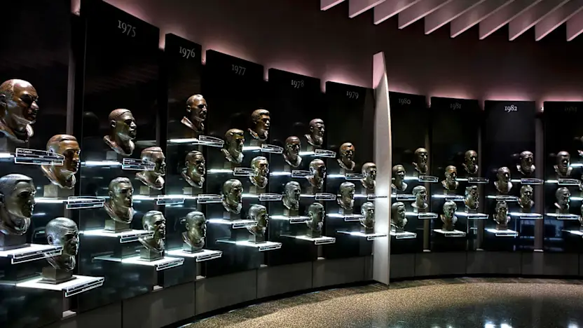 image: A gallery of bronze busts in the Football Hall of Fame
