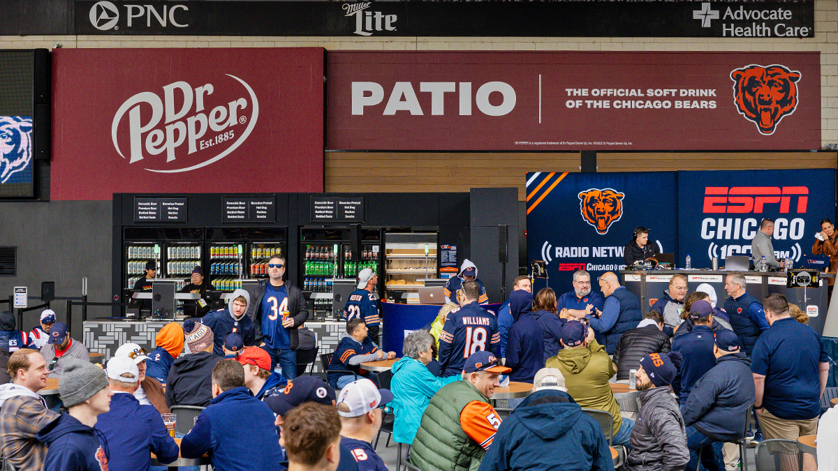 image of fans congregating in the dr. pepper patio at soldier field
