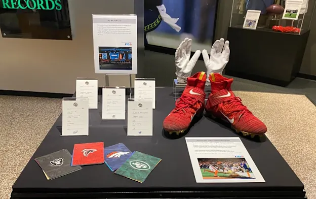 image: News George Kittle's Shoes, Gloves Arrive in CantonKittleArtifacts1050Web.jpeg