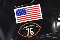 image: News NFL teams to commemorate legends, history with patches for 2025 seasonA football-shaped decal featuring McMichael’s No. 76 will adorn players’ helmets.