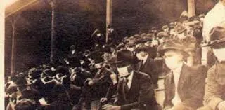 image: News Sports Playbook During 1918 Spanish Flu PandemicCollege_Football_Fans_Wearing_Masks